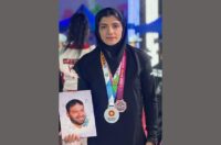 اهدای مدال بانوی نقره ای کشتی آلیش به شهید تهرانی مقدم